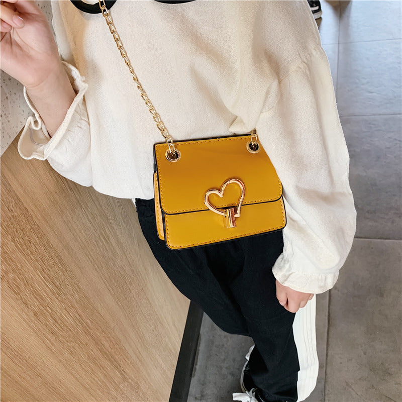 Children's Solid-color Shoulder Bag Fashion Love Hardware Decoration