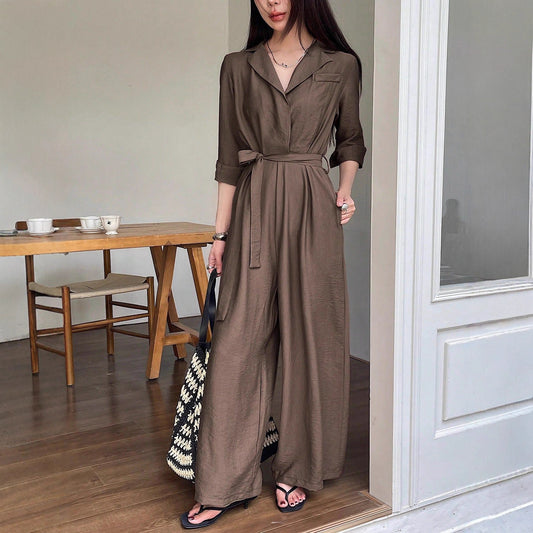 Elegant ensfarvet V-hals langærmet jumpsuit med snøre og brede ben