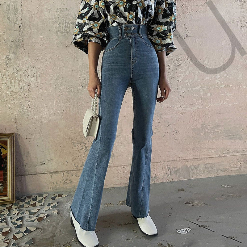 Højtaljede, kropsnære jeans med stretch, syninger og let svaj