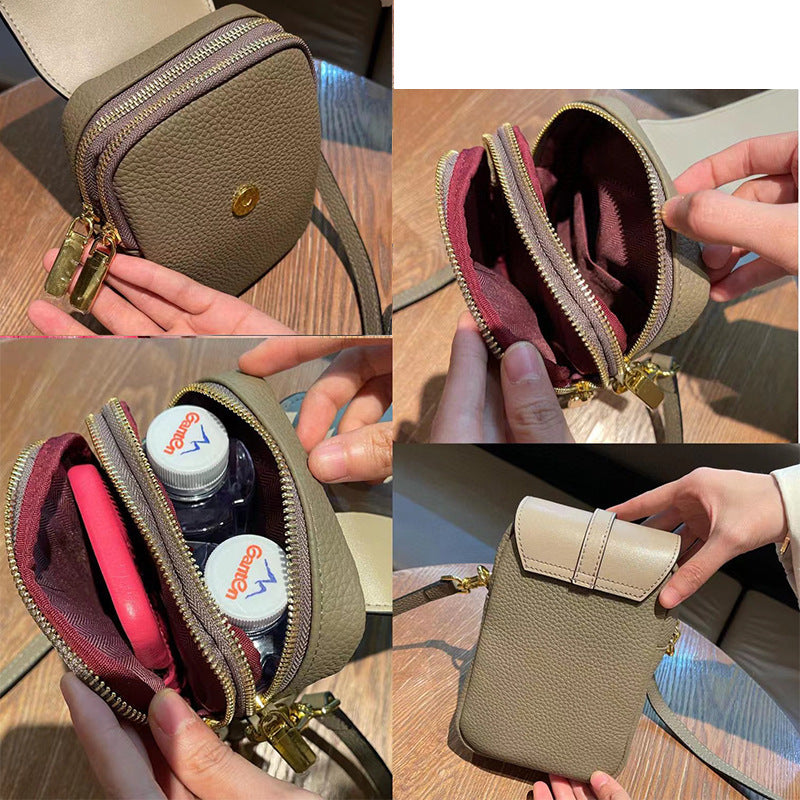 Mobiltaske i retro okselæder med diagonal skulderrem