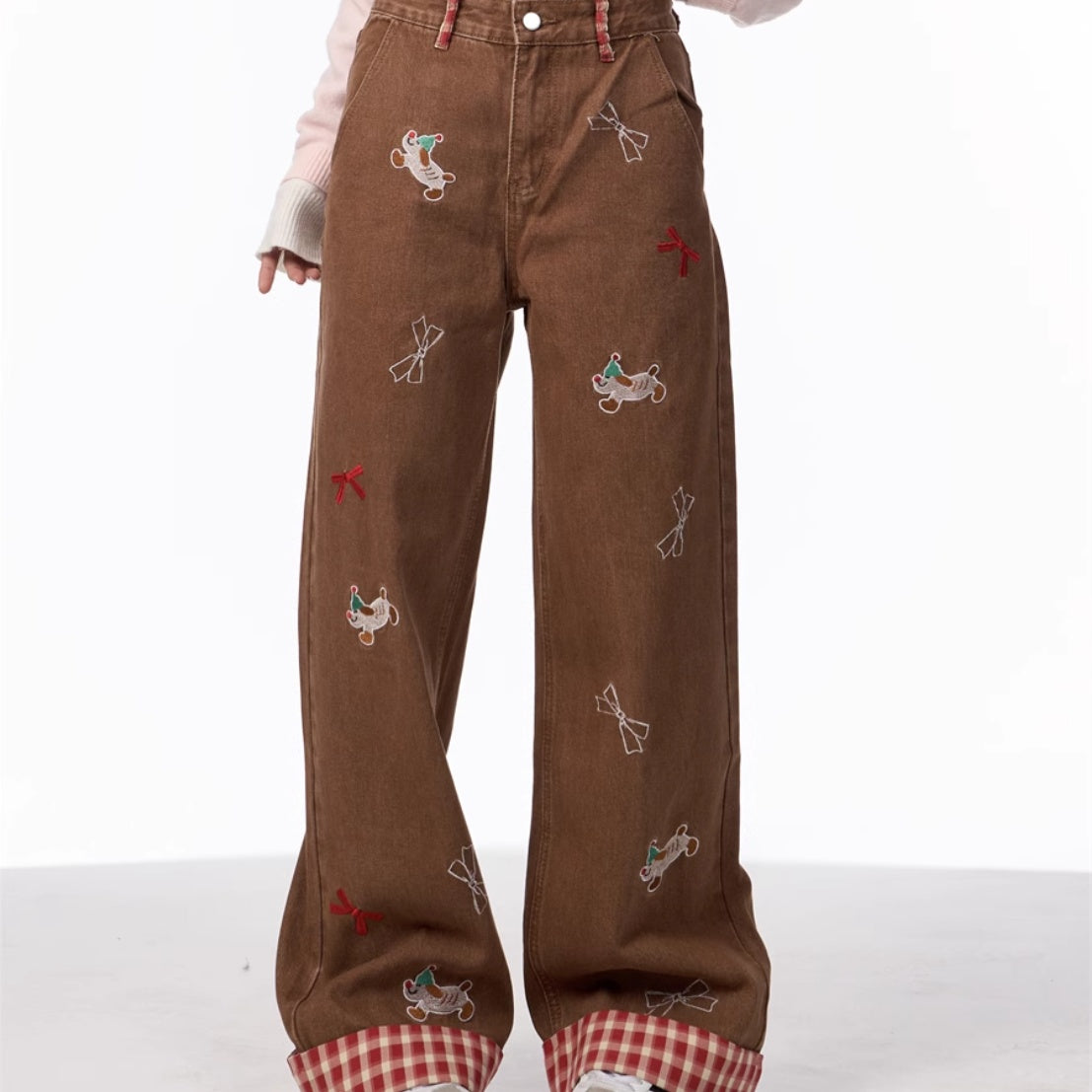 Vintage jeans med broderet sløjfe, hvalpemotiv og vide ben samt høj talje