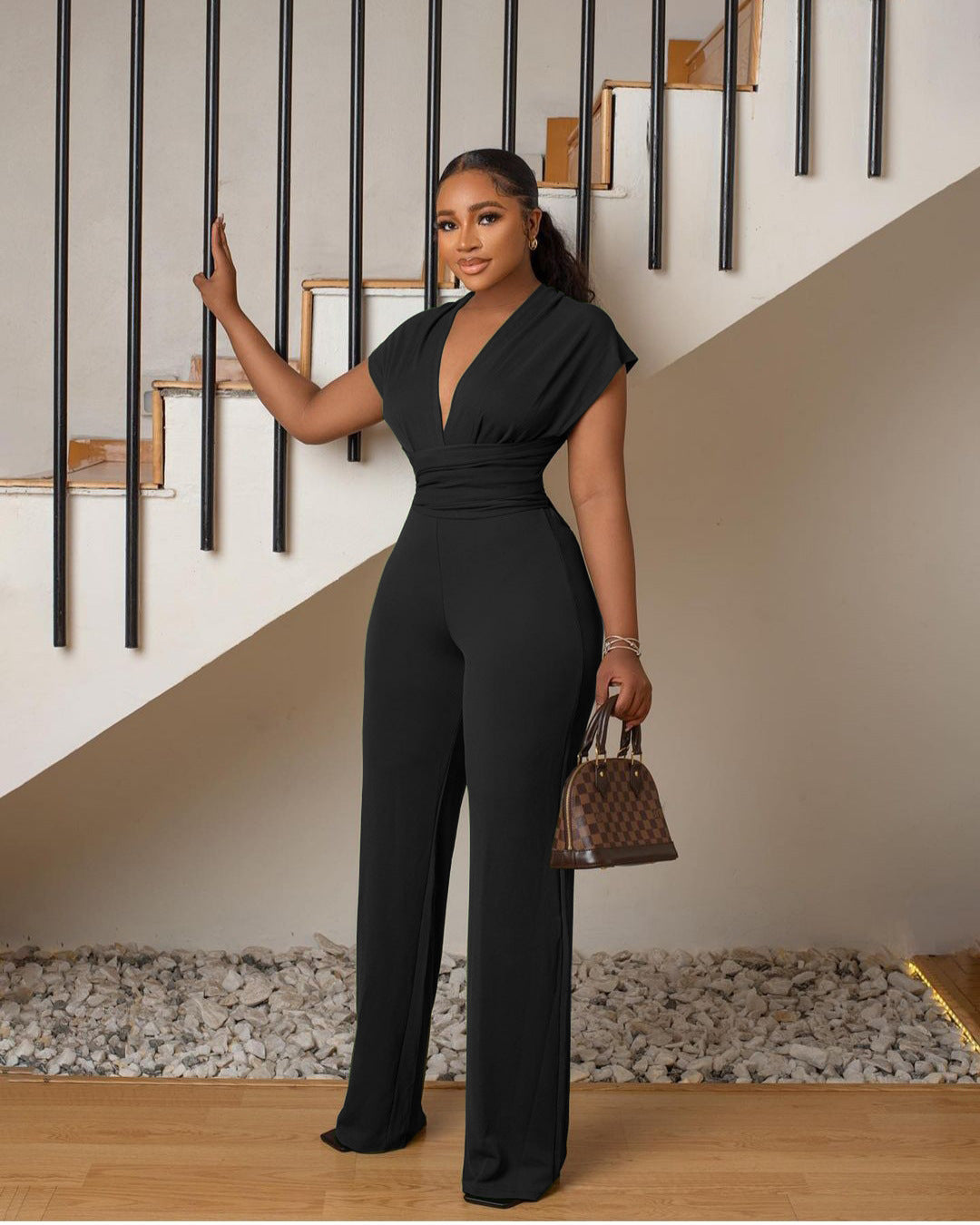 Dame Jumpsuit med ensfarvet talje