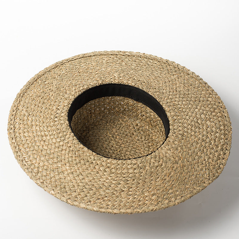 Handwoven seaweed flat top straw hat