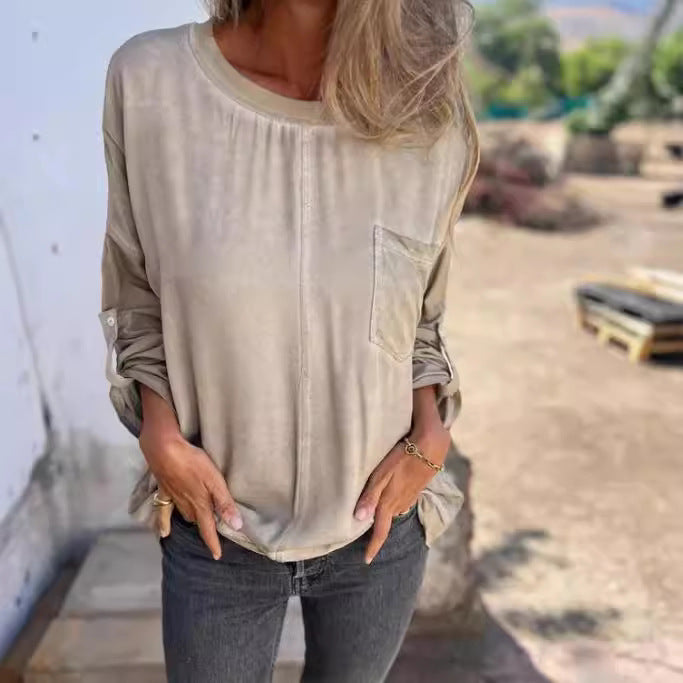 Løs T-shirt med rund hals og lomme til kvinder