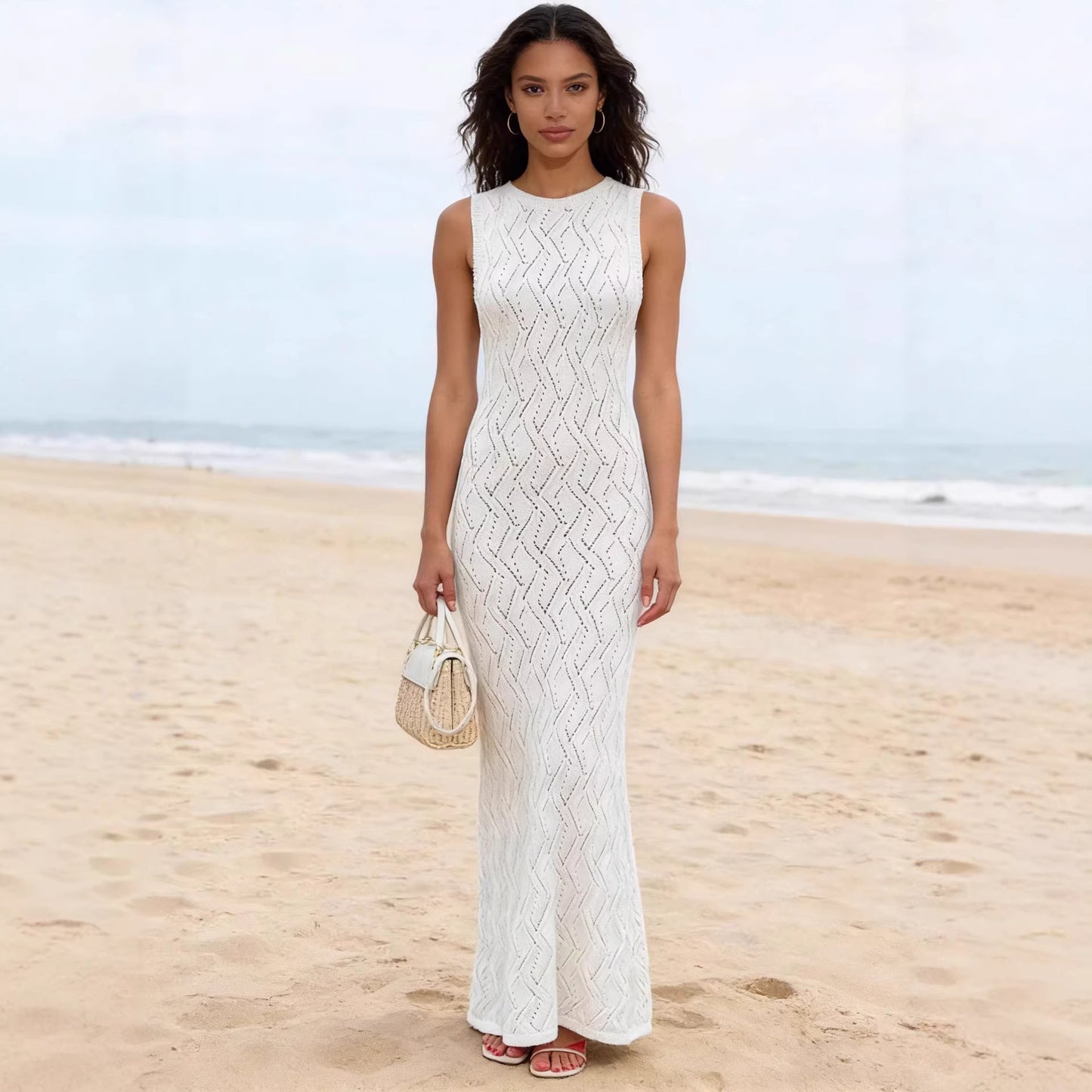 Solid Color Cutout Figure Hugging Knit Dress With A Round Neck And No Sleeves