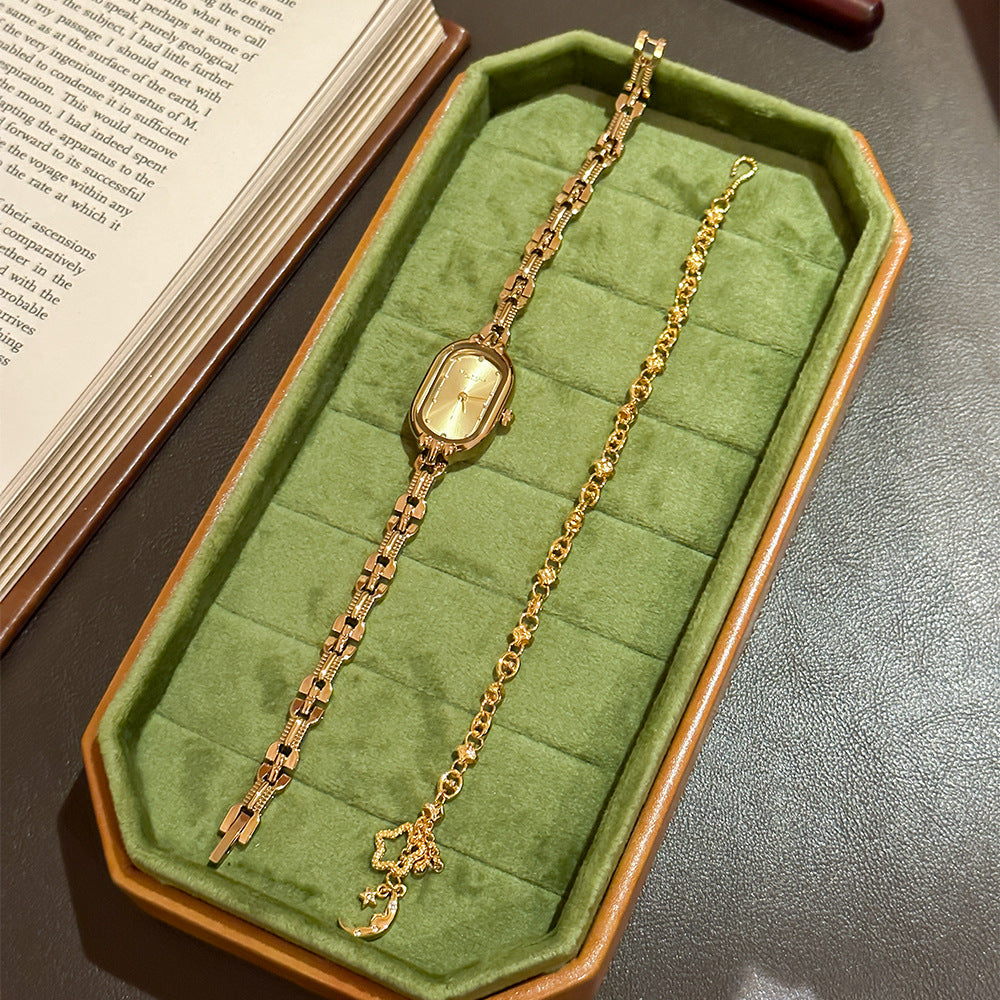 Retro Mid-centurystyle Gold Bracelet Watch With A Niche Design-forward Aesthetic