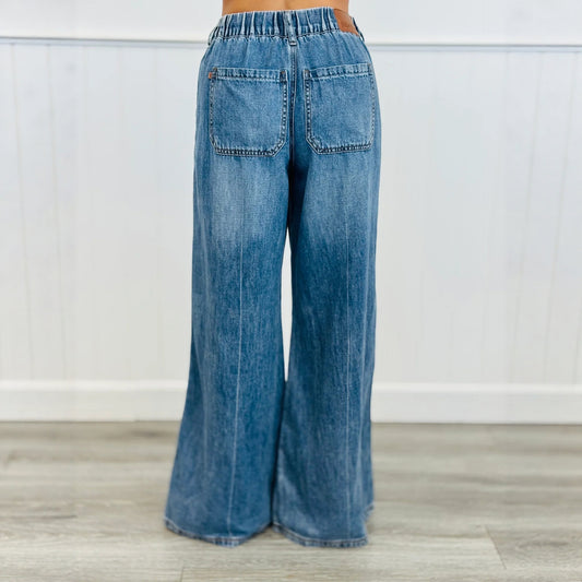 Retro højtaljede let udsvungne jeans med strækbar linning