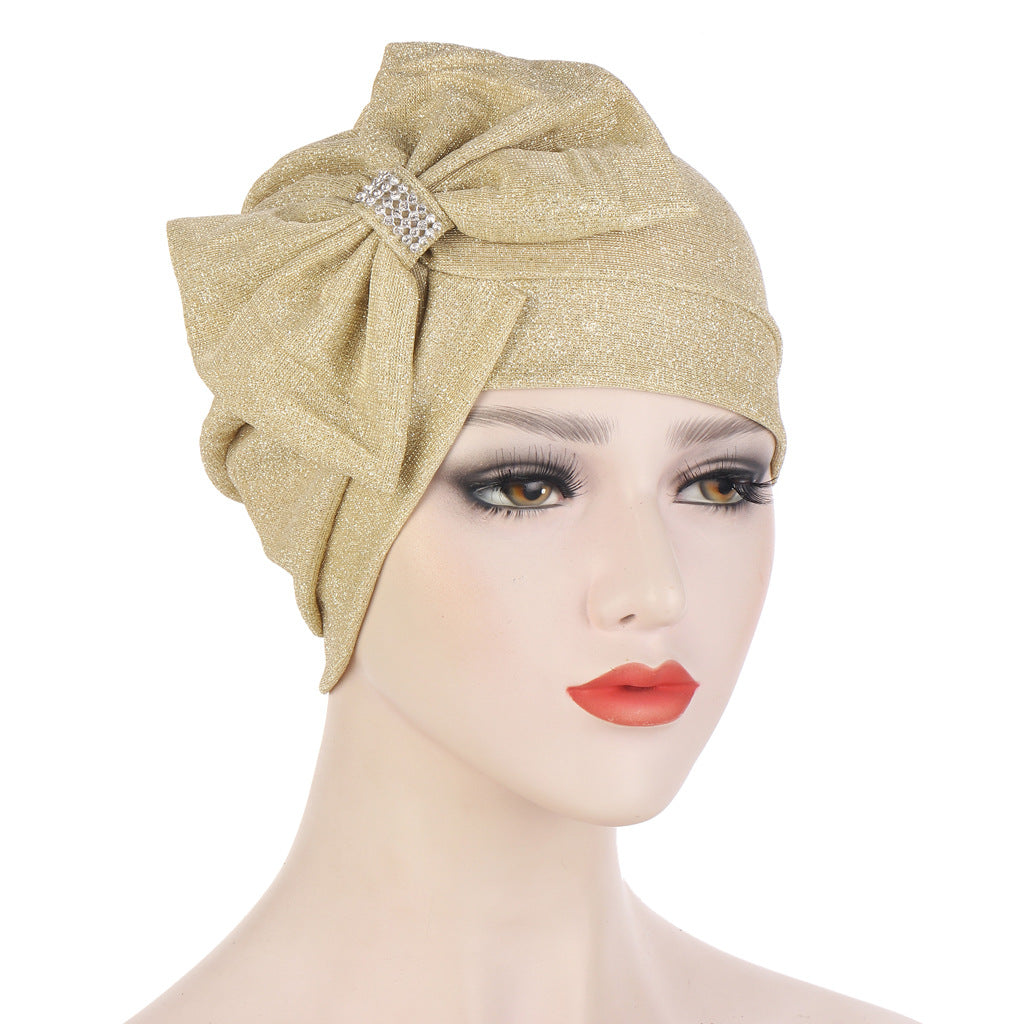 Headband Hat With A Large Cross Bow On The Forehead