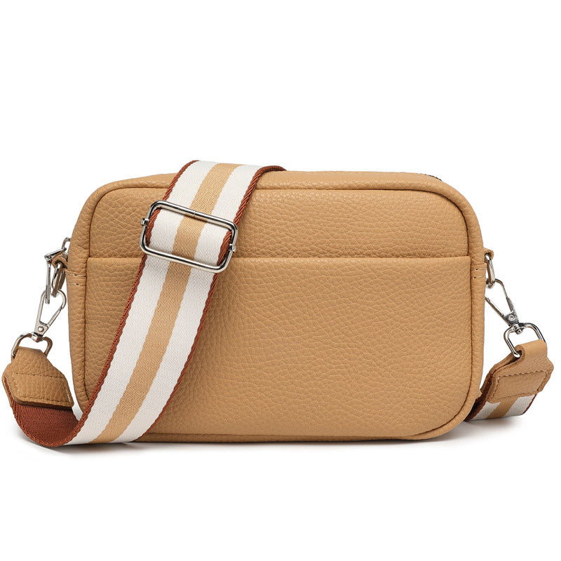 Crossbodytaske med bred skulderrem
