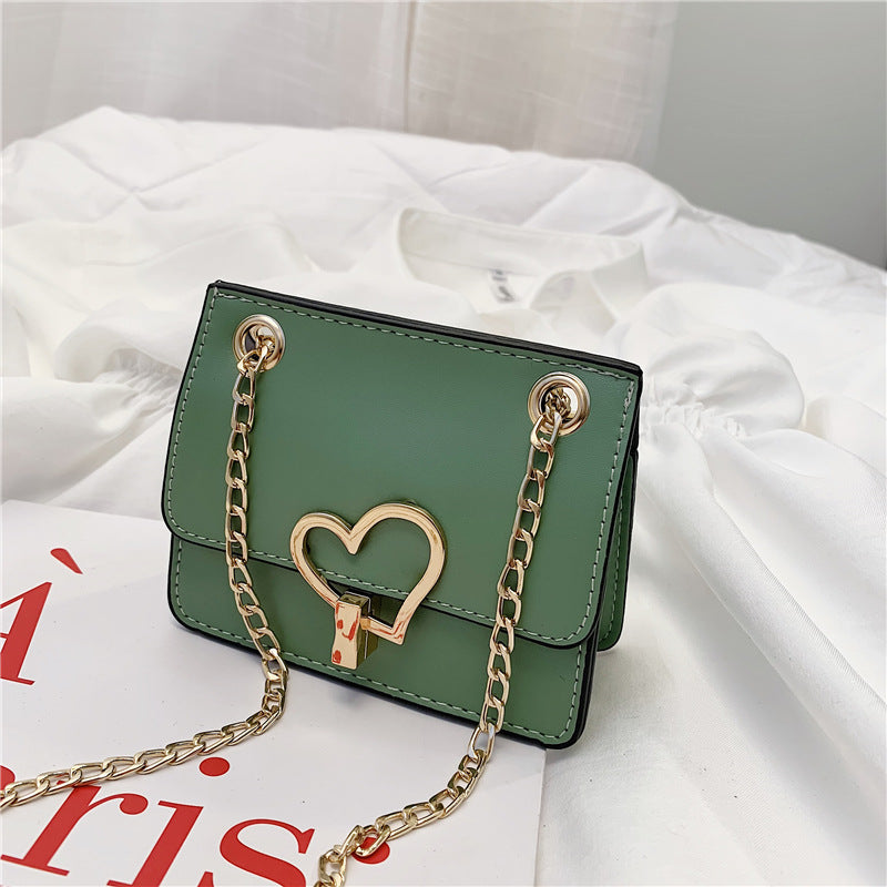 Children's Solid-color Shoulder Bag Fashion Love Hardware Decoration