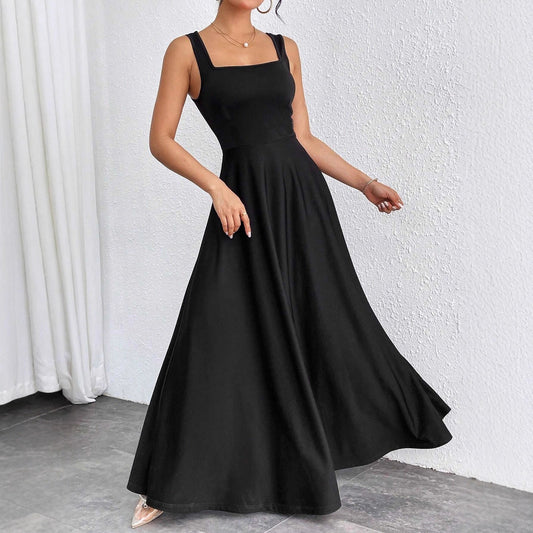 The Woman Is Wearing A Sleeveless Solid-color Dress