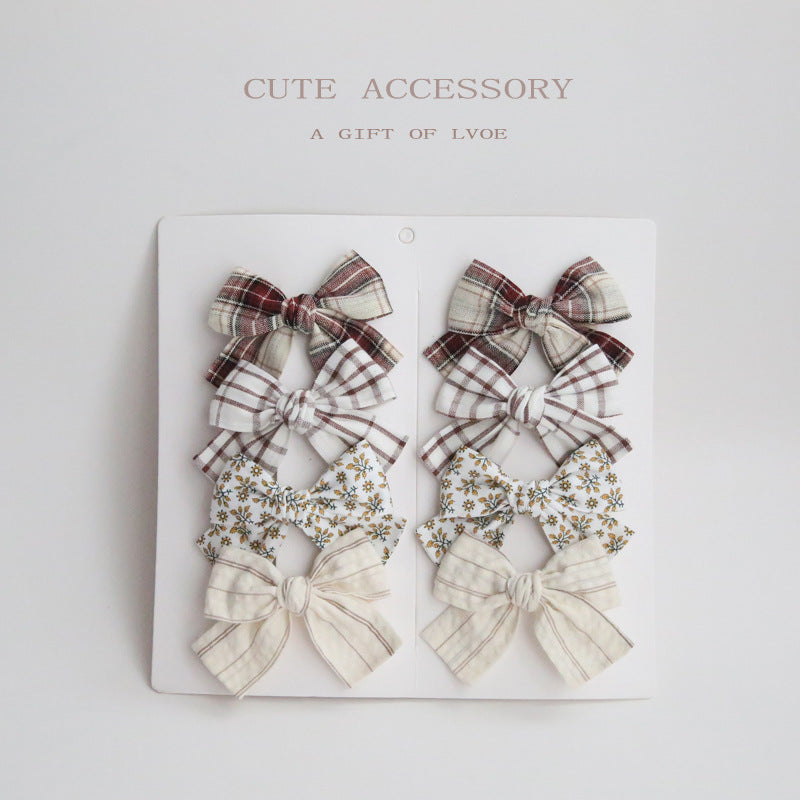 Dovetail Bow Around A Pair Of Hairclips 1 Group