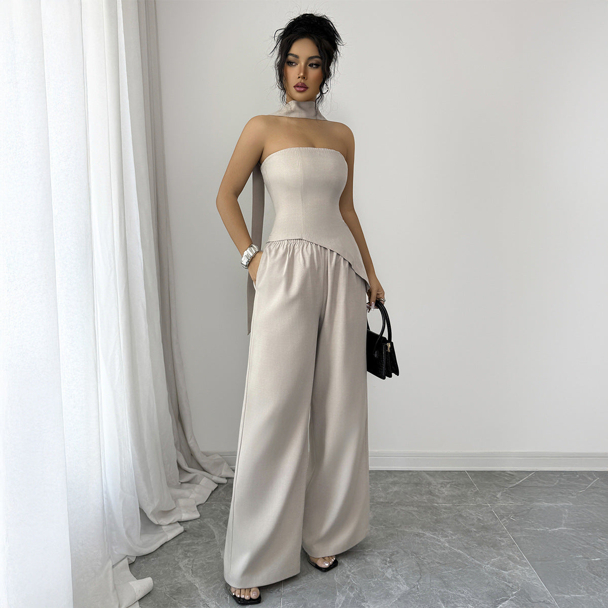 An Elegant And Sophisticated Midriff-baring Top And Bottom Set