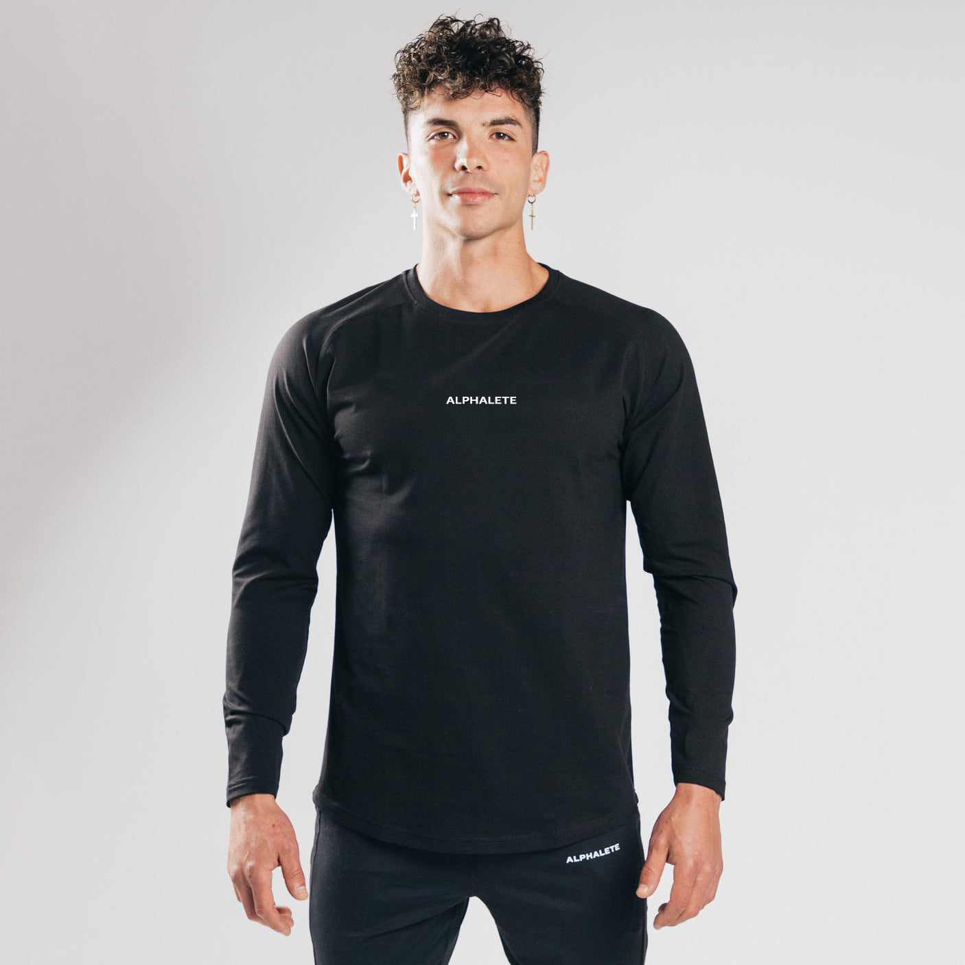 Tætsiddende langærmet T-shirt i elastisk bomuld til at have indenunder