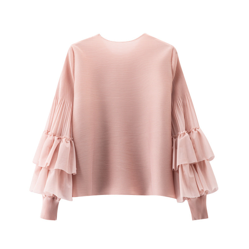 Versatile Ruffled Blouse With Puff Sleeves And A Round Neckline