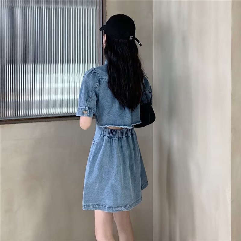 Cleverly Designed Cropped Denim Dress With A Midriff-baring Cut