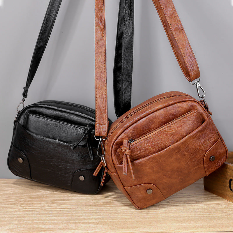 Simple Retro Multi-compartment Travel Fashion Messenger Bag