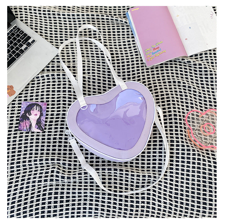 Enkel alt-matchende hjerteformet gennemsigtig hånd-crossbody-taske