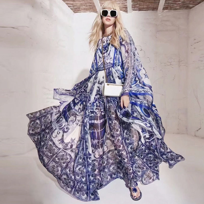 Blue And White Floral Printed Flowing Fairy Dress With Large Swing