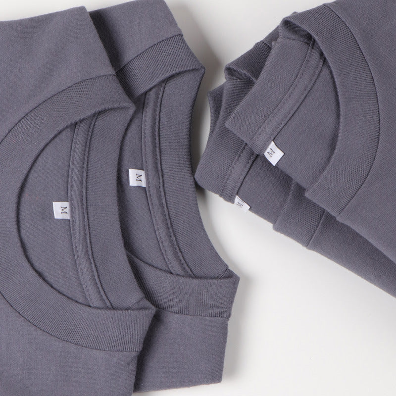 Ensfarvede T-shirts med korte ærmer til mænd og kvinder i bomuld