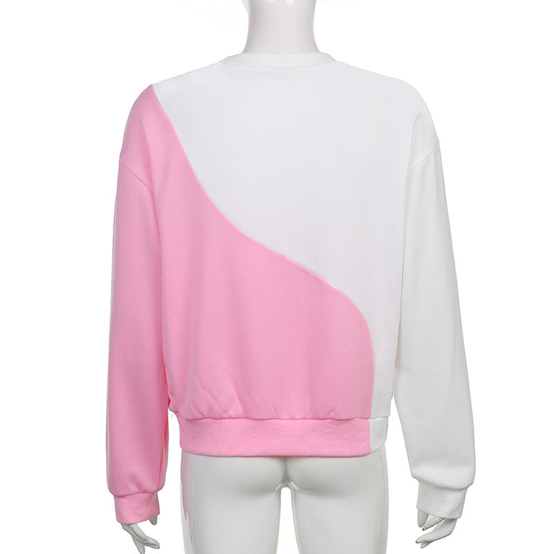 Dame patchwork-sweatshirt med rund hals og lange ærmer i kontrastfarver