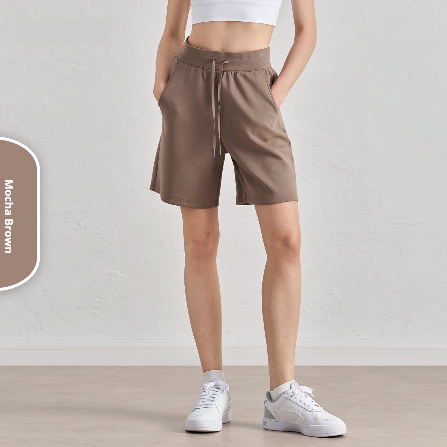 Løse løbeshorts med lagdelte, fempunkts fritidsfitnessshorts