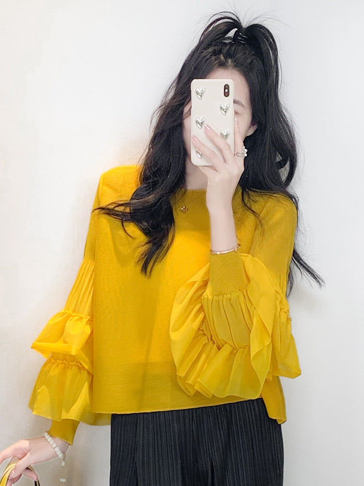 Versatile Ruffled Blouse With Puff Sleeves And A Round Neckline