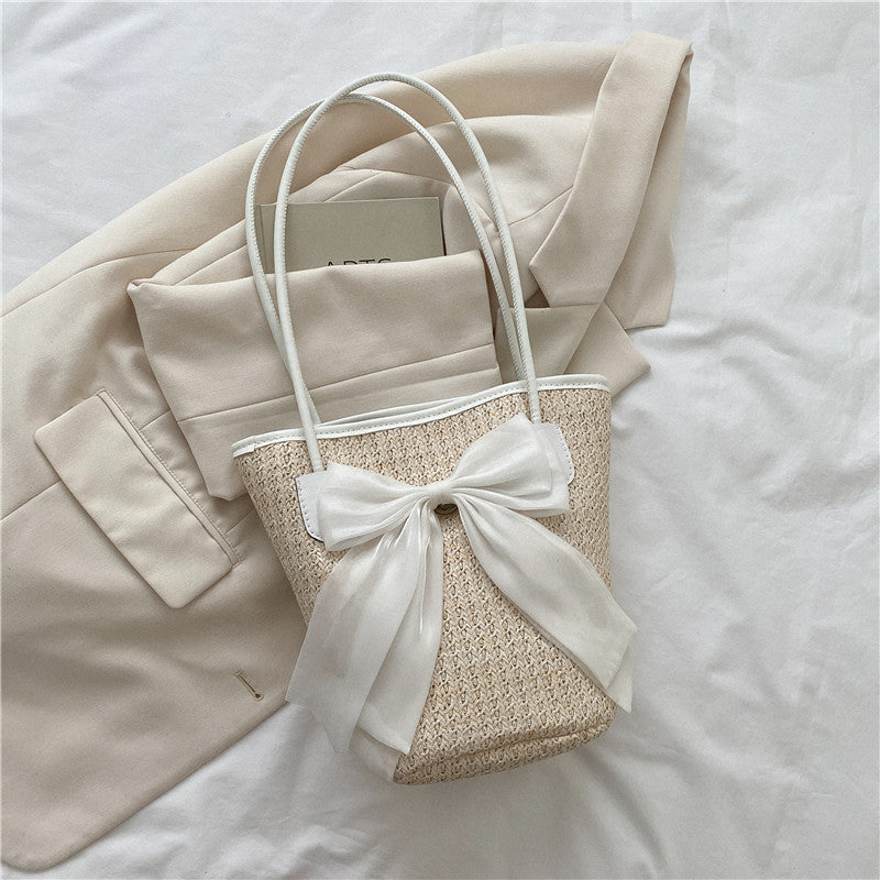 Simple Bow Grass Woven Shoulder Bag