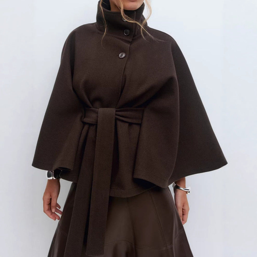 Trench Coat With A Stand-up Collar Buttons And A Belt