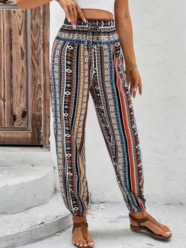 Løs, tilspidset jumpsuit med print, snøre, blomsterprint og lommer
