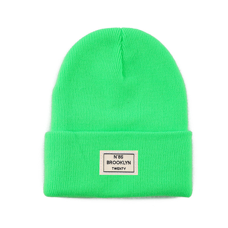 Knitted Beanie With Brand Label Stylish And Fashionable