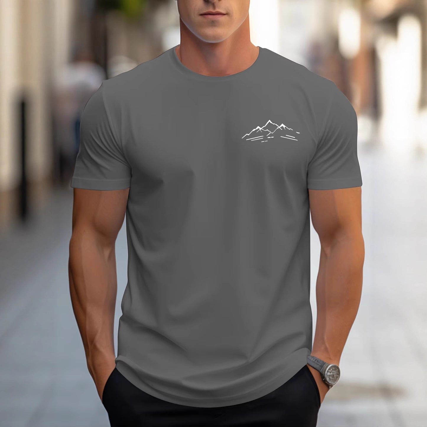 T-shirt med rund hals og korte ærmer i bomuld og afslappet pasform med bjergprint til sport