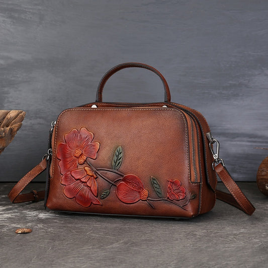 Vintage Cowhide Pillow Bag With Embossed Detailing And A Handheld Design
