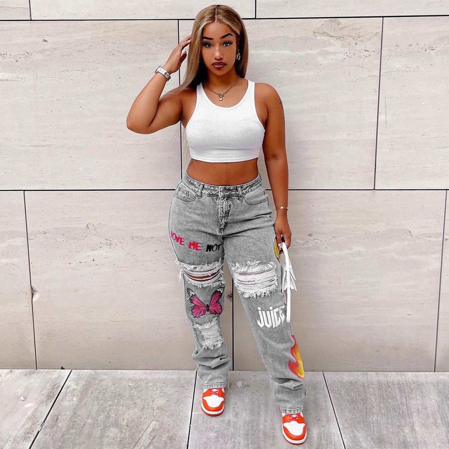 Kvinder digitalt placeret print ripped fashion jeans