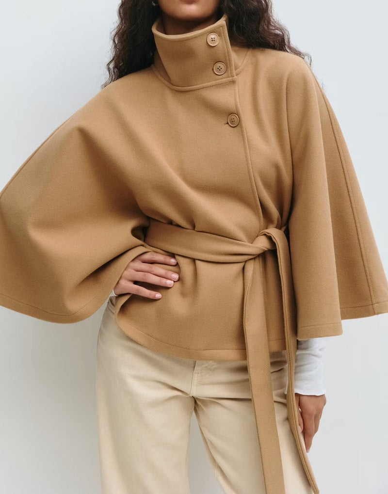 Trench Coat With A Stand-up Collar Buttons And A Belt