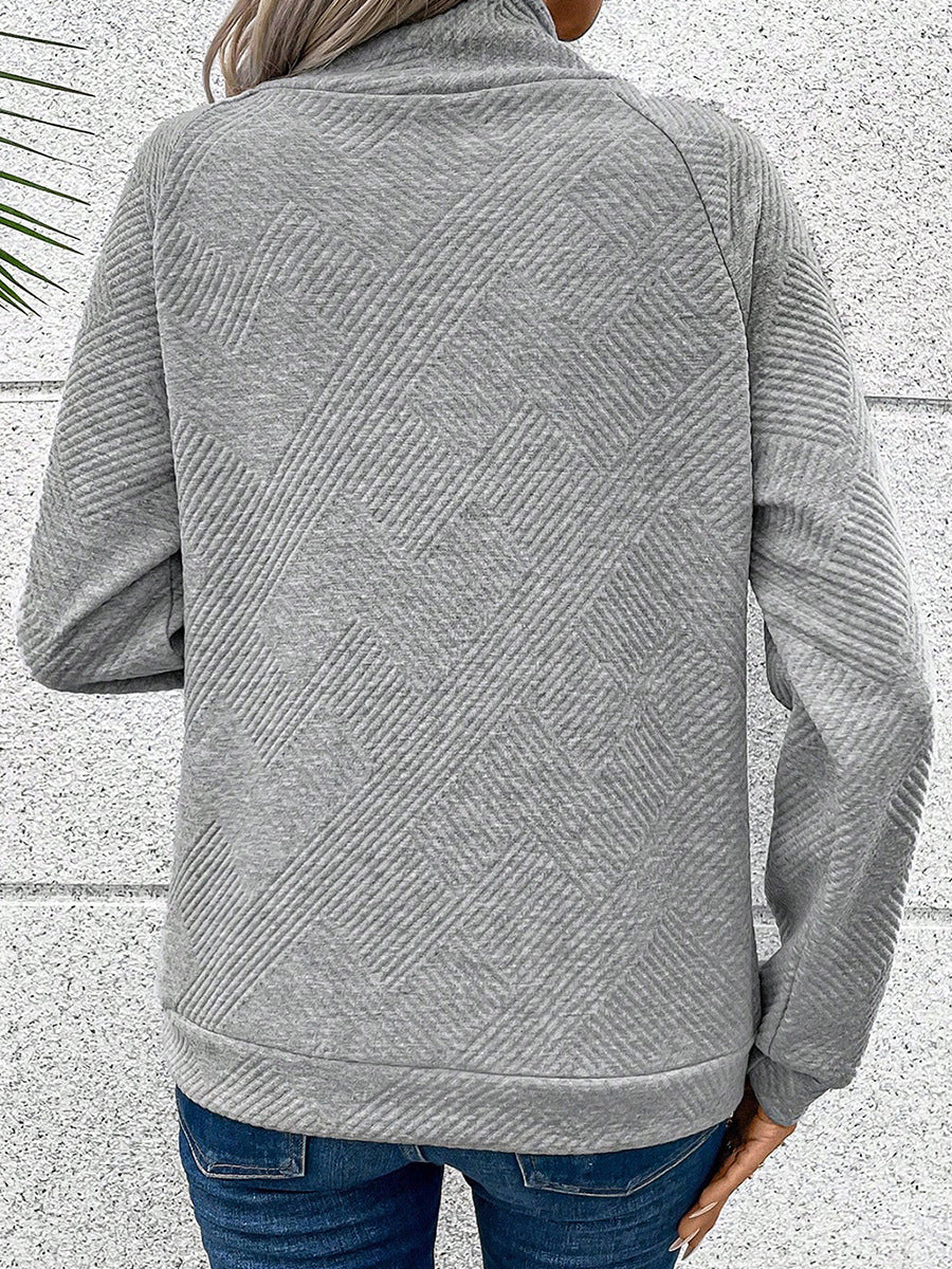 Ensfarvet pullover med lange ærmer