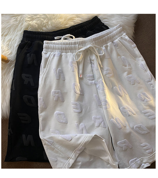 Sporty shorts til damer med bogstavprint