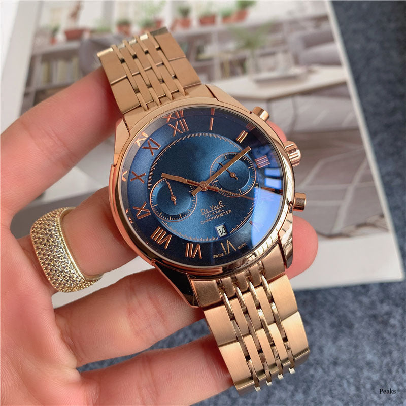 Moderigtigt armbåndsur i rustfrit stål med multifulle femvisere og kalender i trendy afslappet design