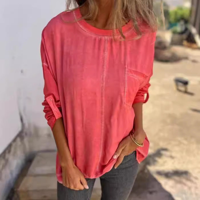 Løs T-shirt med rund hals og lomme til kvinder