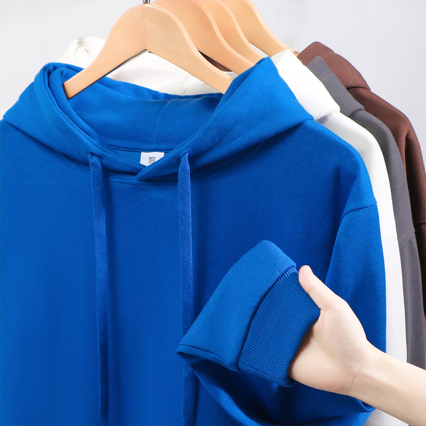 Ensfarvet dobbeltsidet sweater med hætte til kvinder