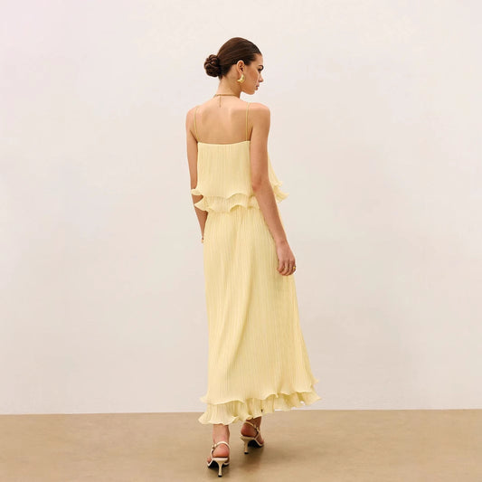 A Designer Skirt Set Featuring A Top With French Lace Detailing