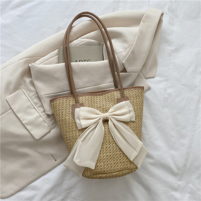Simple Bow Grass Woven Shoulder Bag