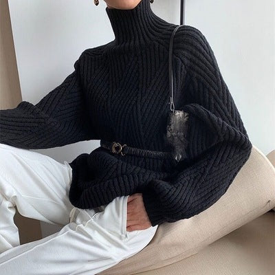 Tag en tyk sweater på, der sidder løst, til vinterbrug udenfor.
