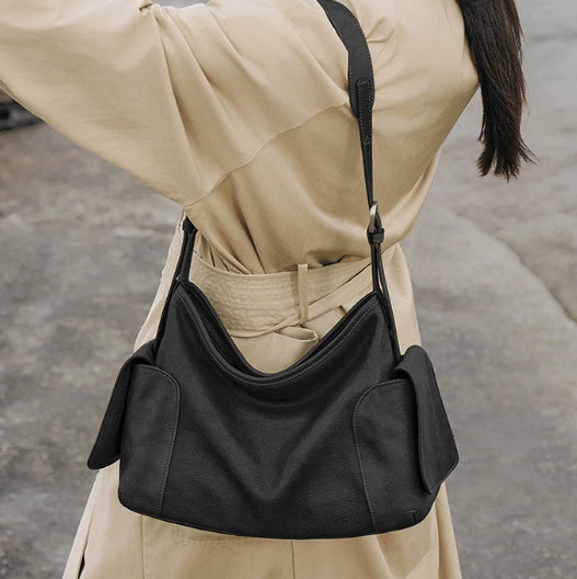 Stor crossbody-taske i ægte læder med to hanke