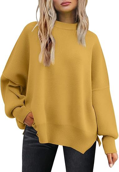 Strikket sweater med rund hals, løs pasform og slidser i siderne. Ensfarvet sweater med flagermusærmer til kvinder.