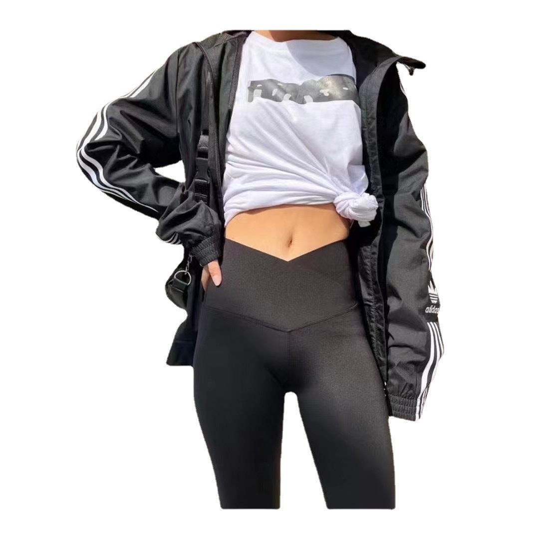 Dame-leggings med kryds i taljen i hajskindsstof