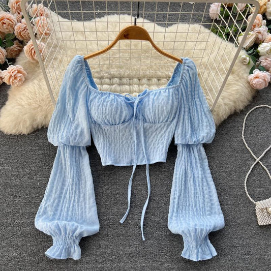 Bow-tie-cinched Figure-hugging Long-sleeve Top