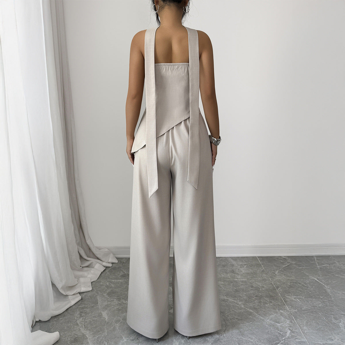 An Elegant And Sophisticated Midriff-baring Top And Bottom Set
