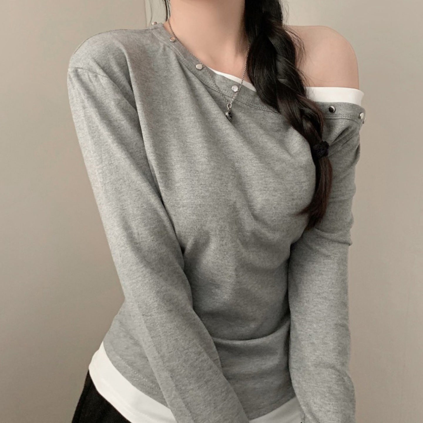Designed As A Faux Two-piece This T-shirt Features A Slanted Shoulder And Contrasting Colors