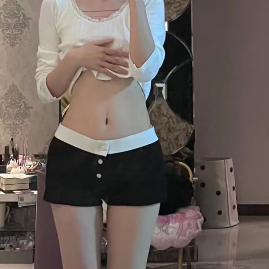 Korte blomstrede shorts med lav talje til kvinder